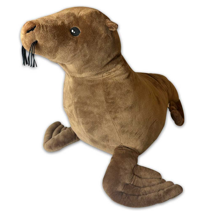 The Earth Pal Sea Lion Plush is a soft, brown sea lion toy with dark eyes, black whiskers, and flippers, made from eco-friendly recycled materials and displayed on a white background.