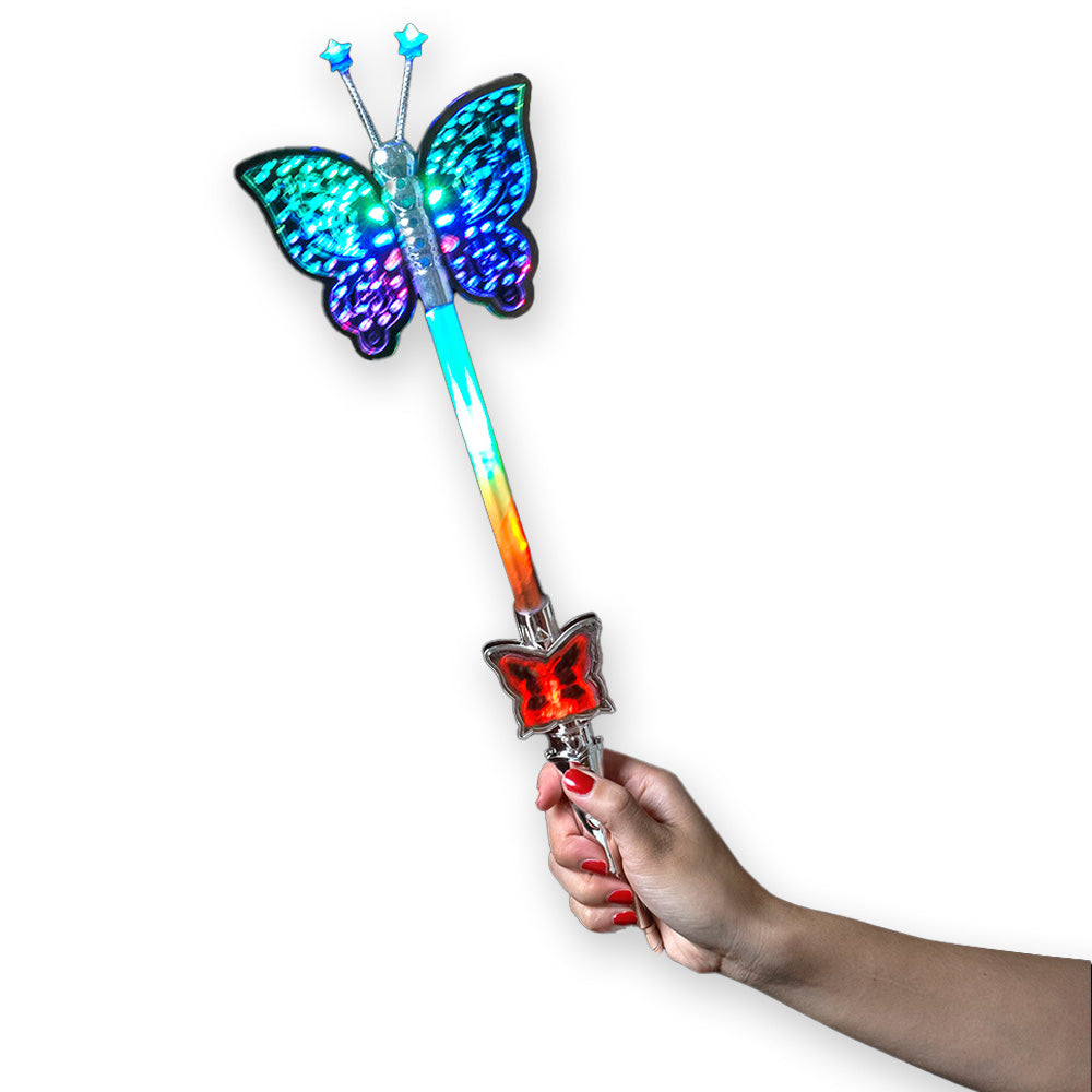 A hand holds the Butterfly Light Up Wand, featuring a glowing, colorful butterfly on top and a red butterfly on the handle. This kids’ toy illuminates in multiple colors and is shown against a white background.