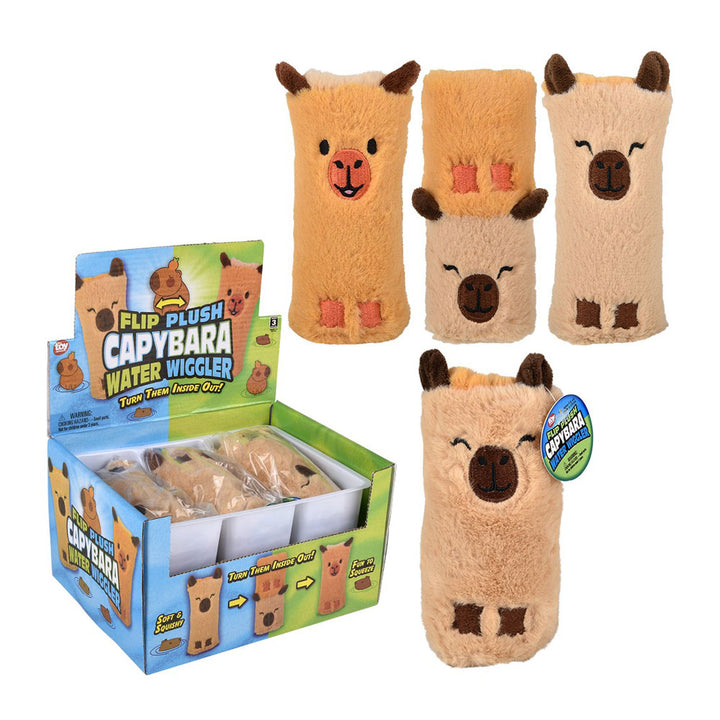 Four Capybara Plush Water Wiggler toys, each with a cute face and ears in assorted brown shades, are displayed beside an open box labeled “Flip Plush Capybara Water Wiggler.”.