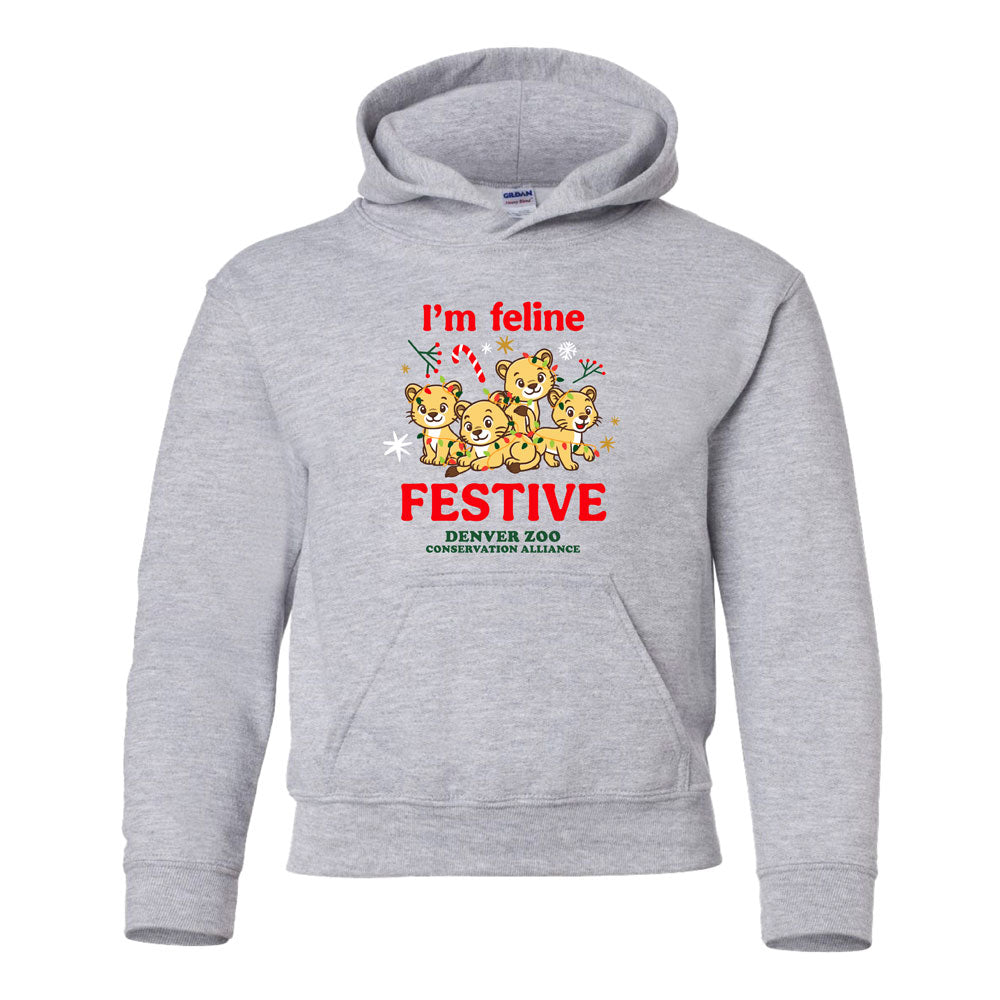 The DZCA Feline Festive Youth Hooded Sweatshirt features cartoon lion cubs in holiday gear, "Im feline FESTIVE" text, and Denver Zoo Conservation Alliance printed below—perfect for festive holiday style!.