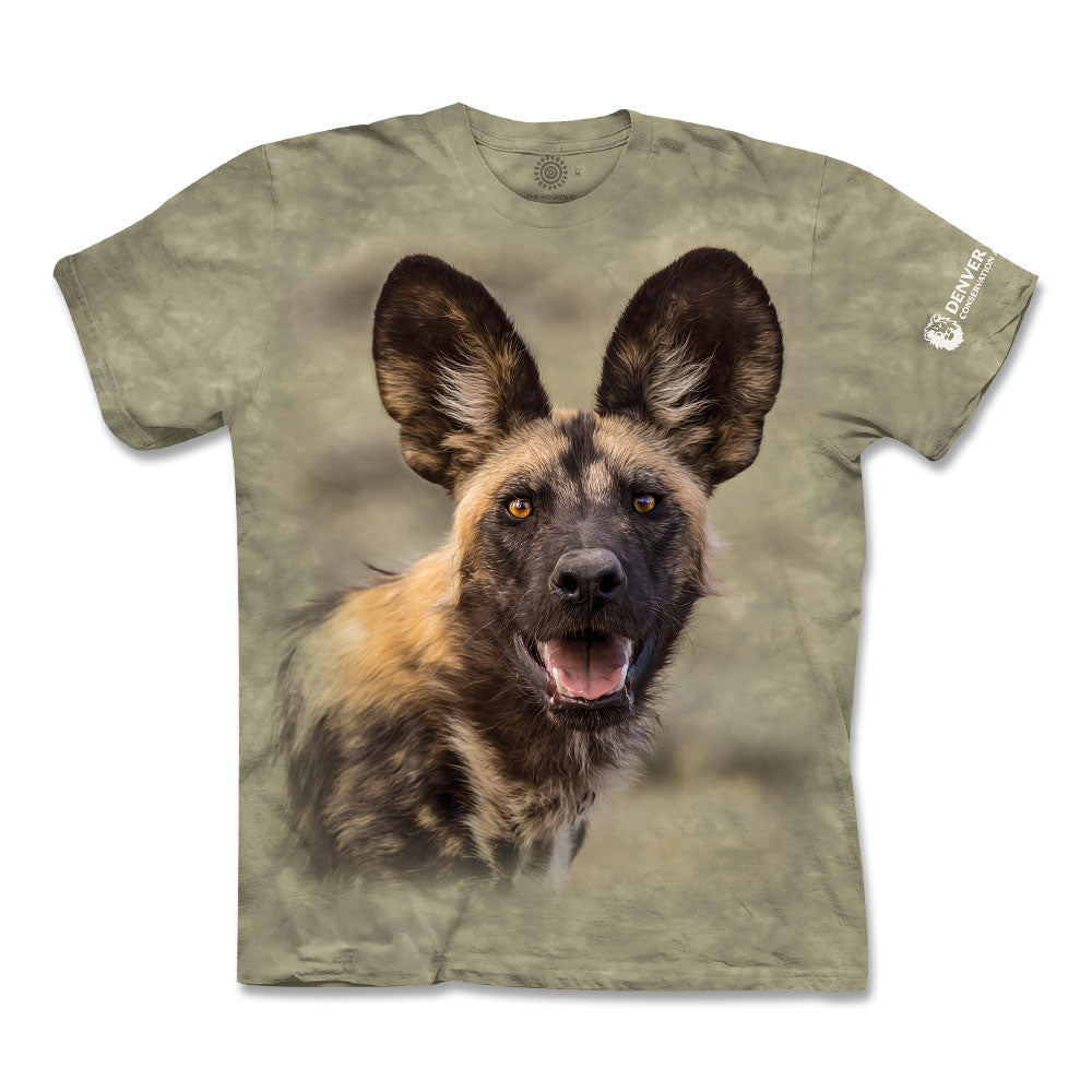 The DZCA African Wild Dog T-Shirt is khaki-colored and features a large, realistic wildlife print of the dog's face—rounded ears, open mouth, and alert expression—centered on the front.