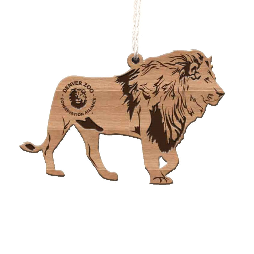 The Wood Lion Ornament is a laser-cut lion with a detailed mane and Conservation Alliance logo, crafted from sustainable wood. It features a top string for easy hanging, making it a unique addition to your collection.