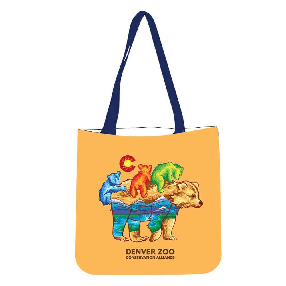 The DZCA Bears Tote is a yellow bag with navy handles, featuring a bear carrying three colorful cubs, a red "C" above them, and "DENVER ZOO CONSERVATION ALLIANCE" text at the bottom.
