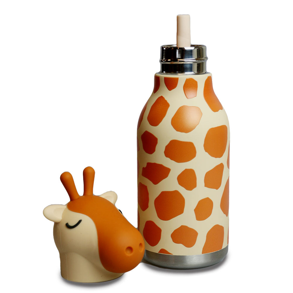 The Giraffe Water Bottle is double-walled, vacuum insulated, and leakproof, featuring an orange and cream giraffe pattern, a metal rim, a top straw, and a matching giraffe-shaped cap placed beside it.