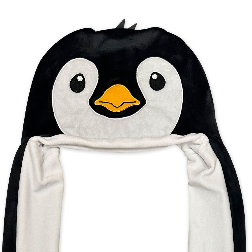 The Penguin Longpaw Hat is a plush cartoon-style hat with big eyes, a yellow beak, and long white wing-like flaps—perfect as a playful costume accessory or cozy winter headwear.