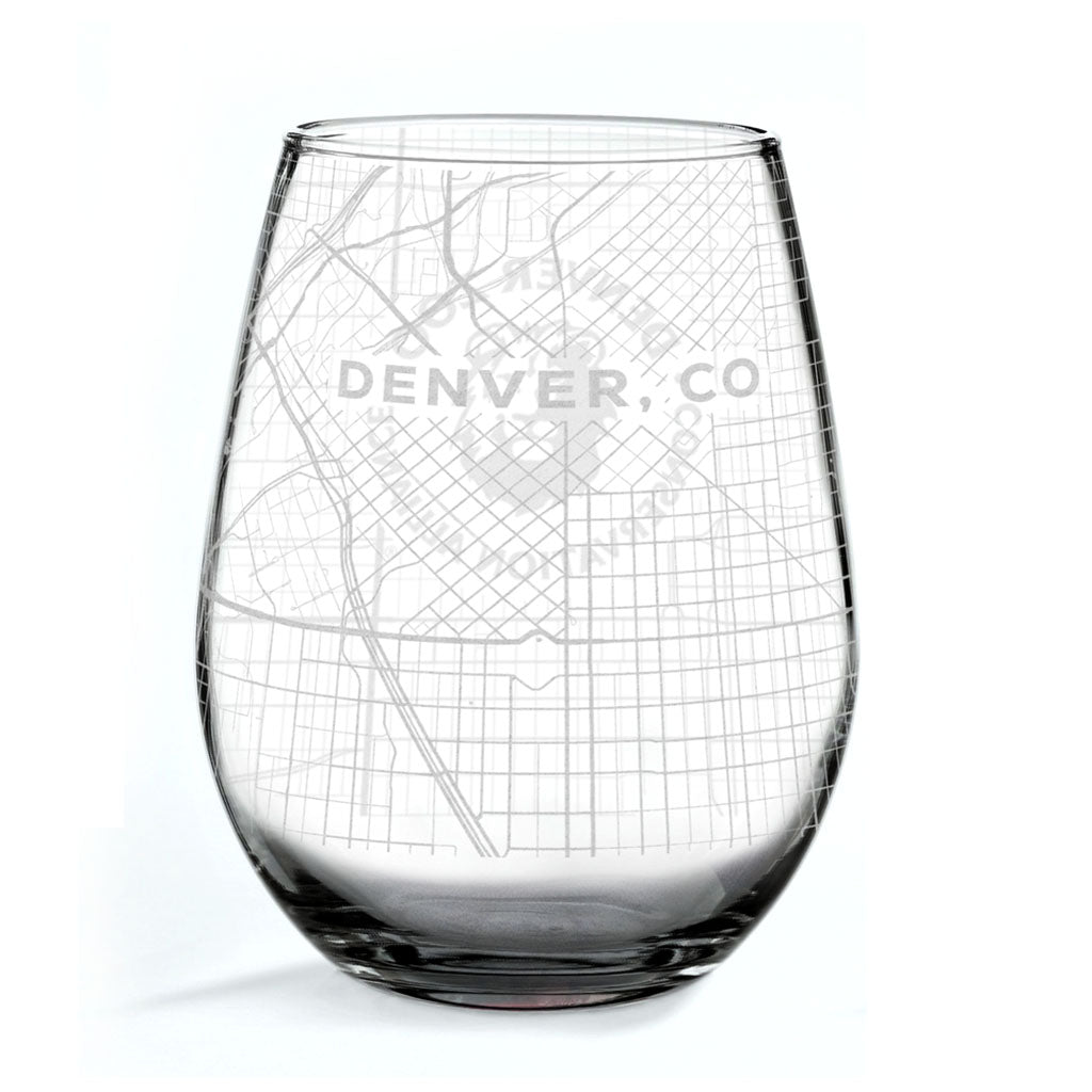 The DZCA Wine Glass is a clear, stemless, eco-friendly glass etched with a detailed street map of Denver, Colorado, featuring "DENVER, CO" in bold across the middle.