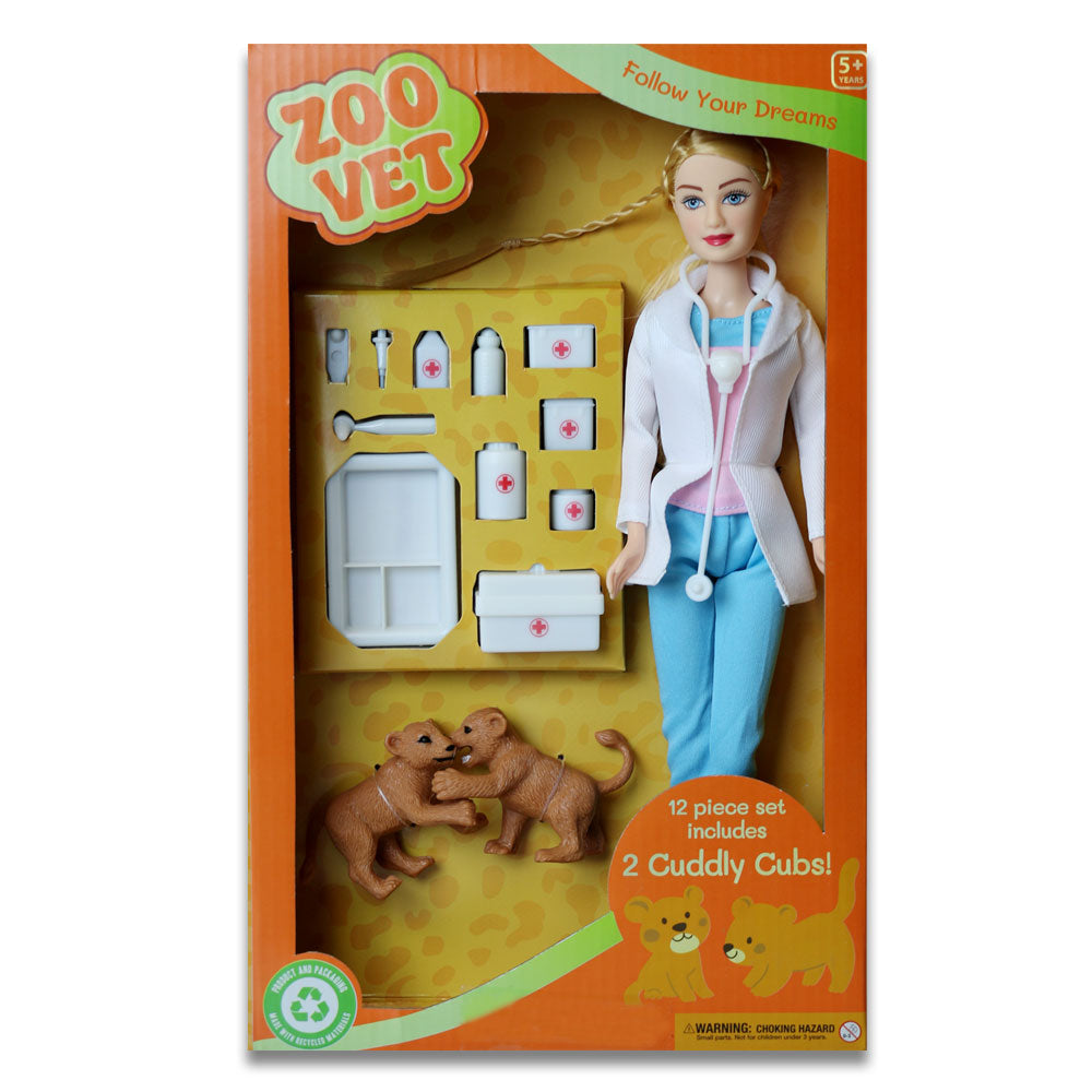 The Eco Zoo Vet Doll toy set includes a doll dressed as a zoo veterinarian, two cub figures, and vet accessories, all packaged in an eco-friendly orange and green box with animal graphics.