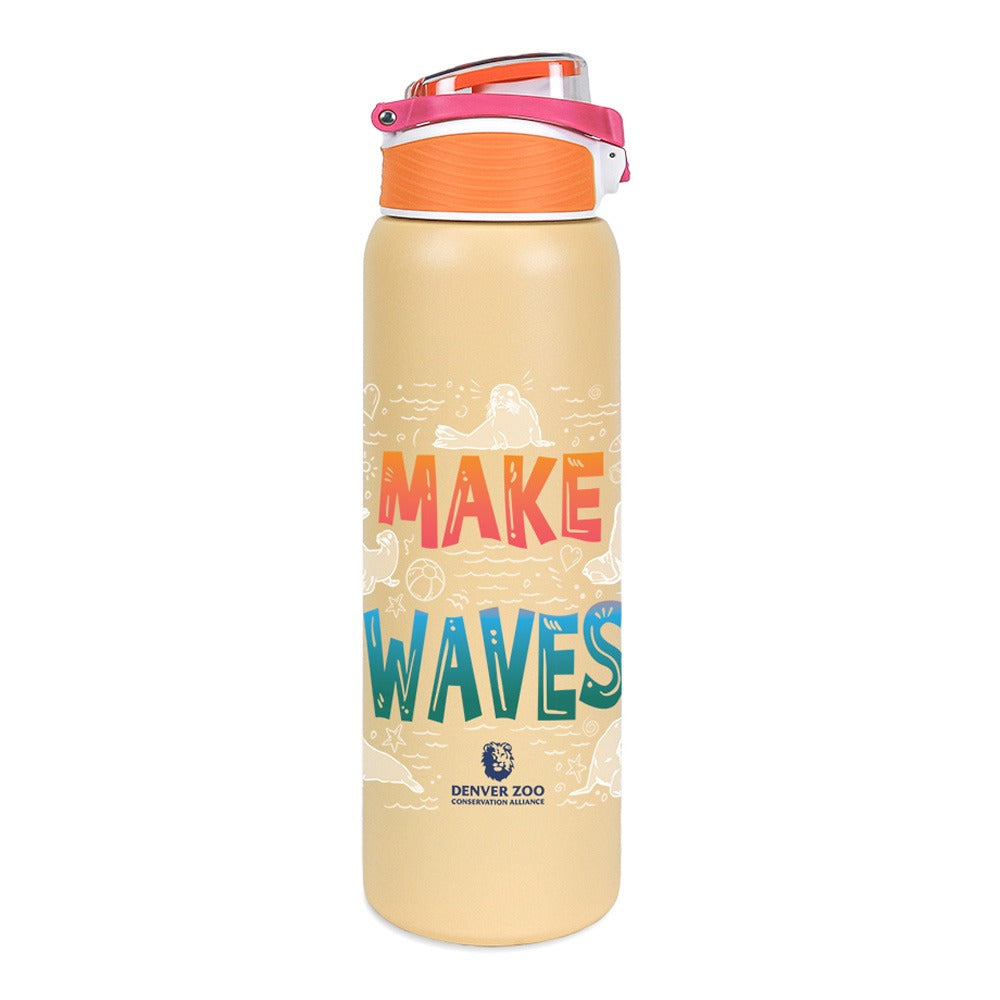 The DZCA Sea Lions Make Waves Water Bottle is beige with an orange lid, pink handle, colorful "MAKE WAVES" text, the Denver Zoo logo beneath, and white line drawings of sea lions and aquatic animals in the background.