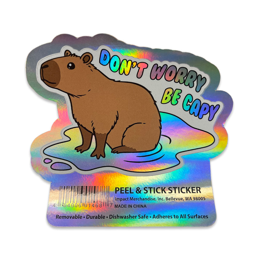 The Dont Worry Capybara Sticker is a holographic, durable, removable, and dishwasher safe sticker showing a capybara in water with "Don't Worry Be Capy." Perfect for wildlife fans or as a Denver Zoo keepsake. Peel & stick on any surface!.