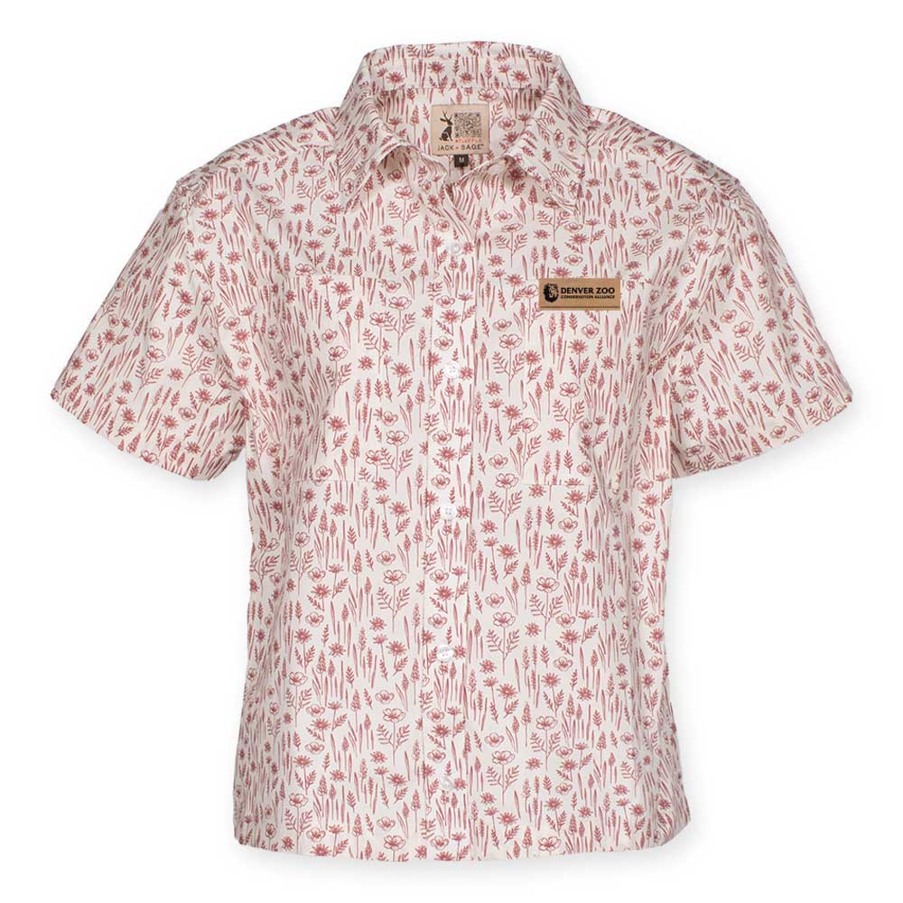 The DZCA x Jack and Sage Wild Flowers Women's Button-Up Shirt is a short-sleeved top with a red and white botanical print, blending feminine elegance and adventure. It features a DENVER ZOO name tag on the left chest.