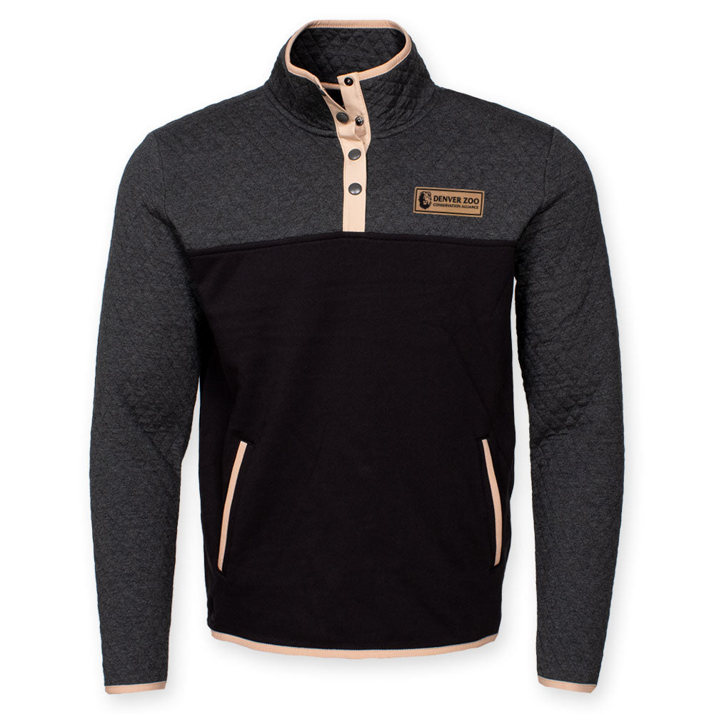 The DZCA x Jack and Sage Quilted Quarter Button Up Fleece is a unisex charcoal and black pullover with light beige trim, quarter button collar, side pockets, and a “Denver Zoo” chest patch. The design is modern and simple.