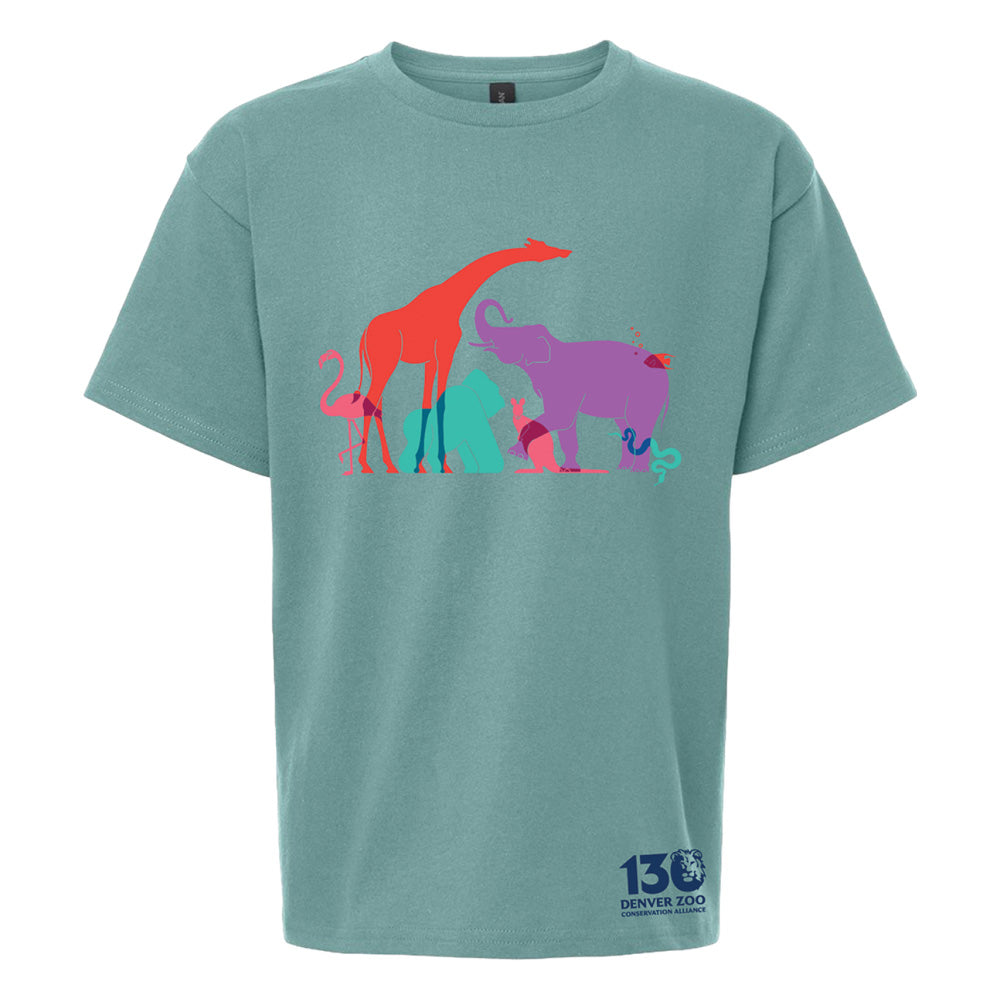 The DZCA 130th Anniversary Youth T-Shirt in teal showcases colorful animal silhouettes—giraffe, elephant, rhinoceros, lion, and snake—with "130 Denver Zoo" printed in the bottom corner to celebrate Colorado history.
