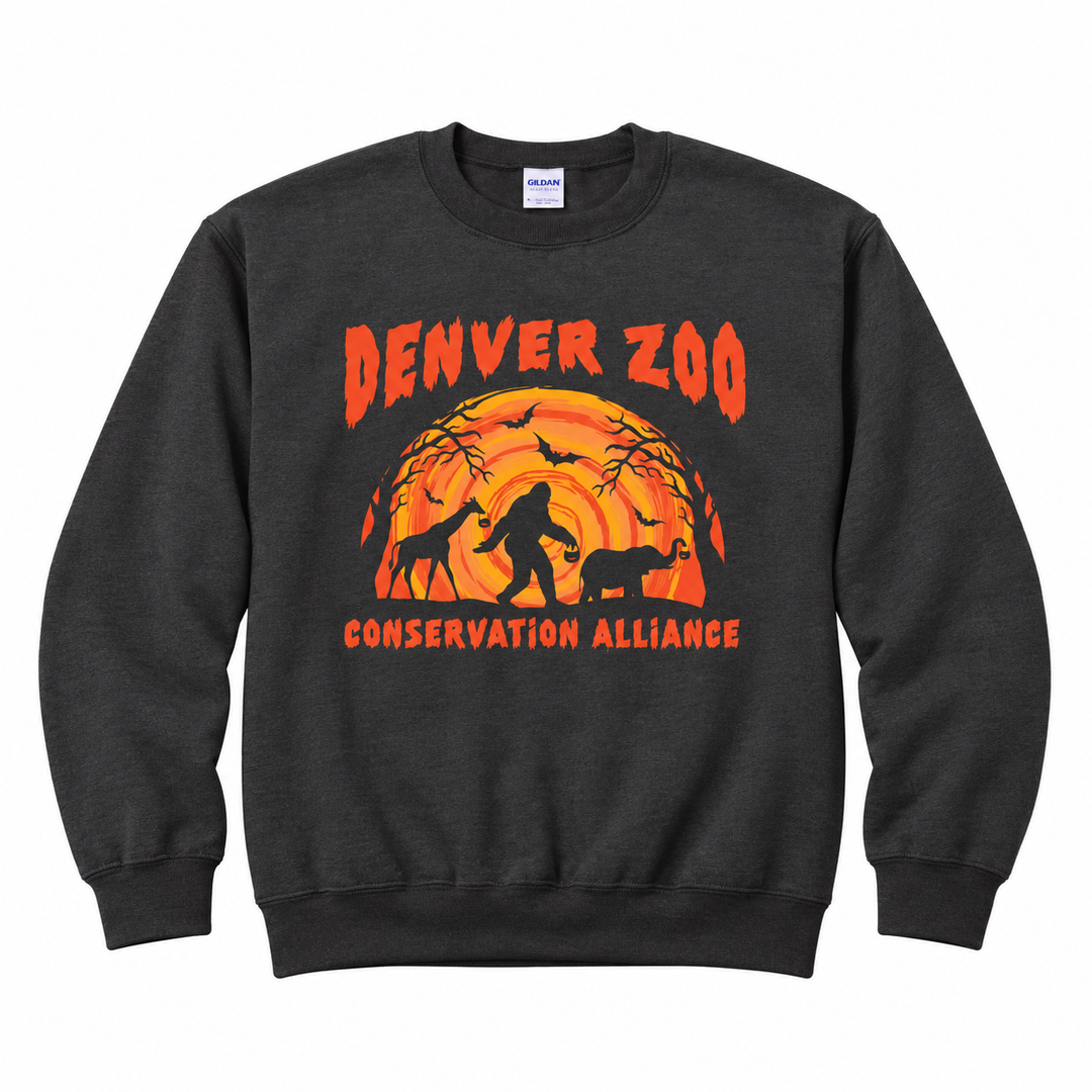 DZCA Spooky Season Crew Sweatshirt in dark gray, featuring a graphic of a giraffe, Bigfoot, and elephant silhouetted against a large orange moon, with the text Denver Zoo Conservation Alliance.
