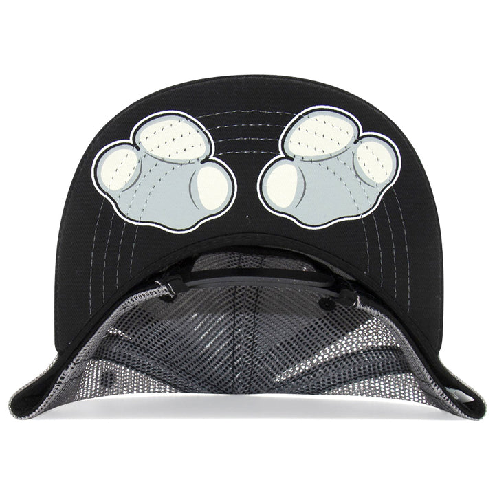 A close-up shows the underside of the Kids Rhino Flat Brim Hat, a black mesh cap with two white cartoon paws printed on its unique brim design.