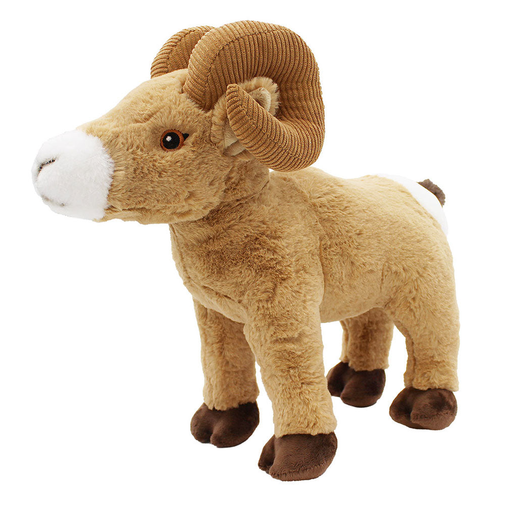 The Bighorn Sheep Plush is a cuddly companion with tan fur, brown curved horns, a white muzzle, and brown hooves. It stands on all four legs and makes a perfect gift for nature enthusiasts.