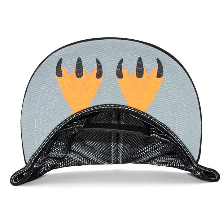The Kids Penguin Flat Brim Hat’s gray underside reveals two orange penguin feet with black claws, designed as if standing on the brim—a playful and unique surprise for young wearers.