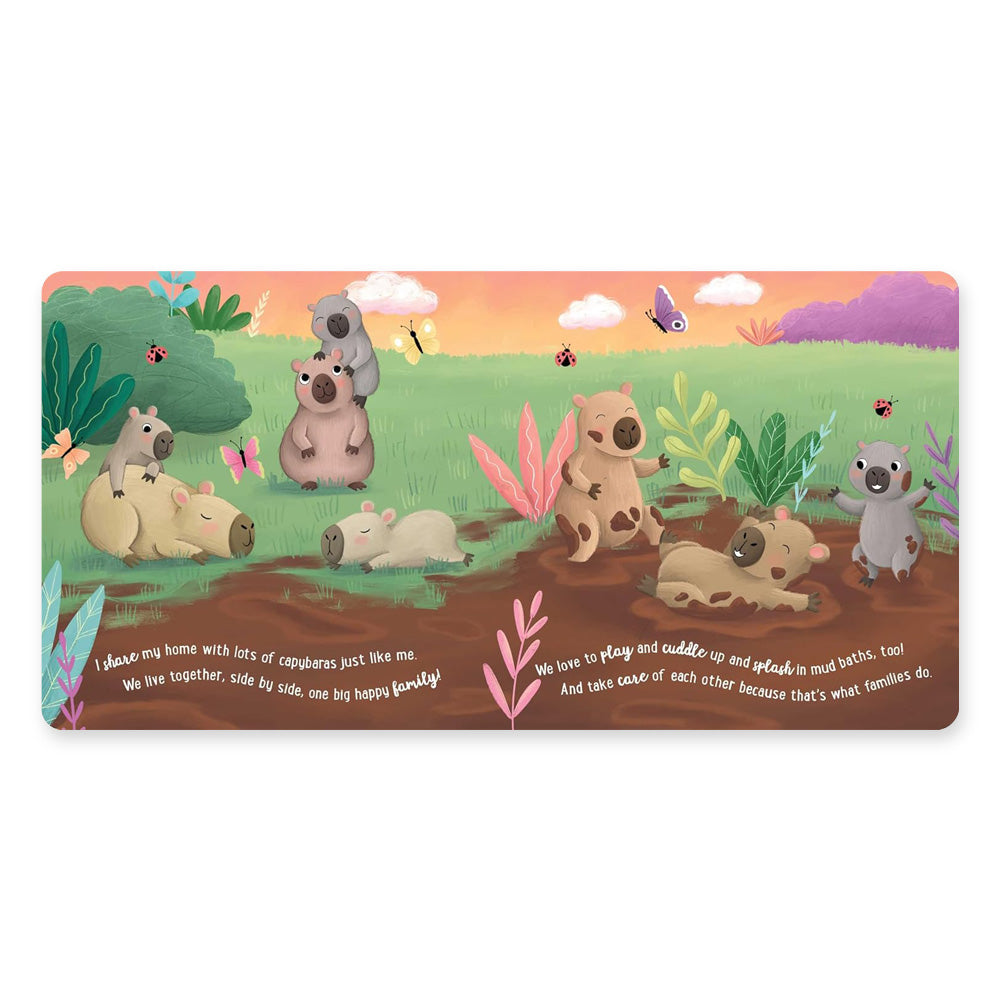 Illustration of capybaras relaxing in a grassy field at sunset, surrounded by colorful plants, featured in "I Love Being a Capybara: Padded Board Book: Picture Storybook," perfect for animal-loving kids and families.