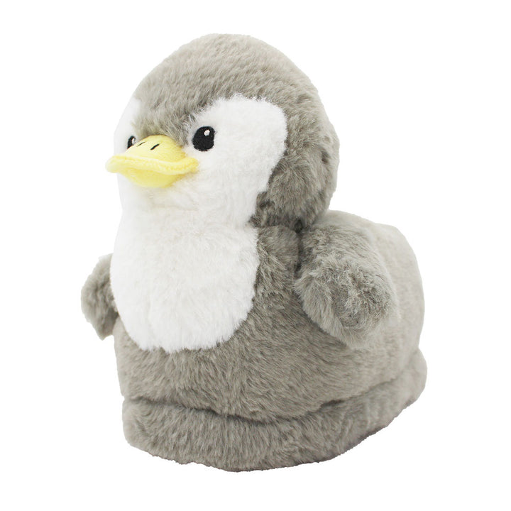The Penguin Plush Slipper is a cozy, soft slipper designed to look like a baby penguin chick, with fluffy grey and white fur, small wings, and a yellow beak—perfect for adding adorable comfort to your lounging routine.