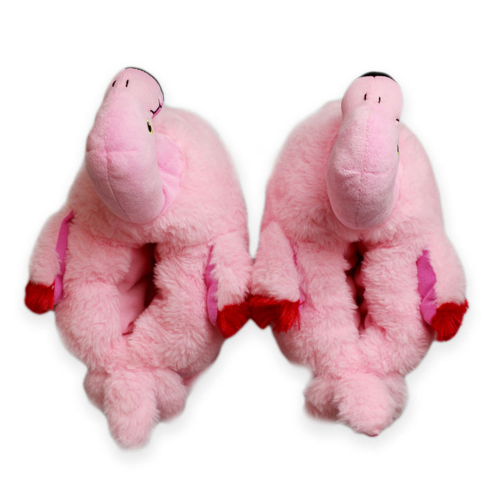 Flamingo Plush Slipper: Cozy pink, fluffy slippers with playful red accents on wings and beaks, displayed side by side on a white background—perfect for comfort with a fun twist.