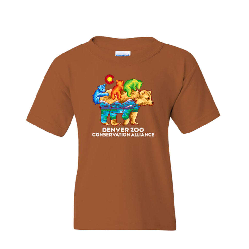 The Youth DZCA Bear Color Pop T-Shirt is a brown tee with a colorful bear graphic inspired by Colorado wildlife, featuring smaller animal shapes and "Denver Zoo Conservation Alliance" text below.