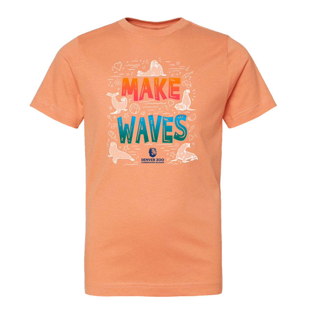 The DZCA Make Waves Sea Lion Youth T-Shirt is an orange unisex tee with "MAKE WAVES" in bold, playful sea animals and water sketches—featuring a sea lion—and a small Denver Zoo logo below the text, promoting conservation.