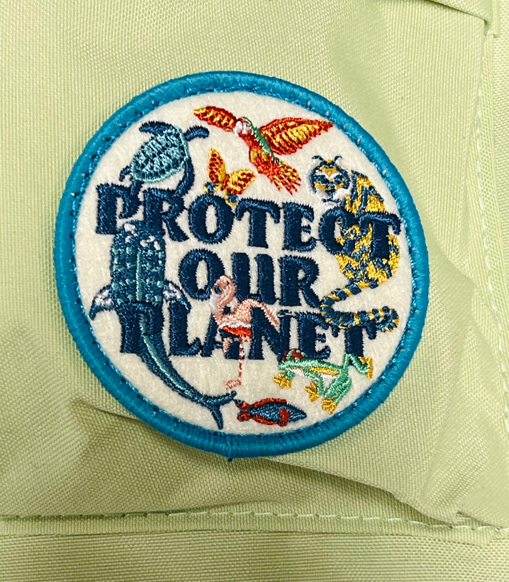 The Protect Our Planet Backpack features a custom-designed patch on light green fabric, embroidered with "Protect Our Planet" and surrounded by colorful animals—whale, parrot, butterfly, flamingo, fish, tiger, and turtle—for eco-conscious style.