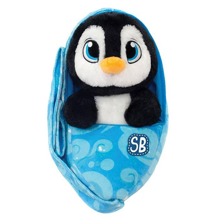 The Swaddle Babies Penguin Plush features big blue eyes and comes wrapped in a soft, blue patterned swaddle blanket with "SB" initials on the front.
