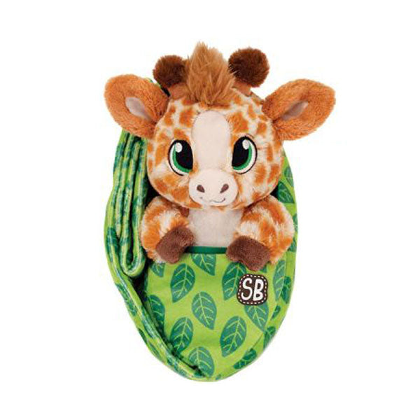 The Plush Swaddle Babies Giraffe features big green eyes and comes in a green leaf-patterned pouch with an SB logo on the front and a matching blanket, displayed against a white background.