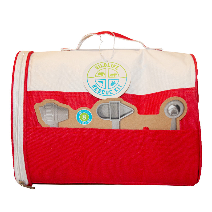 The Wildlife Rescue Kit is a red and white bag with a handle and front pocket featuring cardboard cutouts of rescue tools like a flashlight, shovel, and dish—ideal for caring for plush animals anywhere you go.