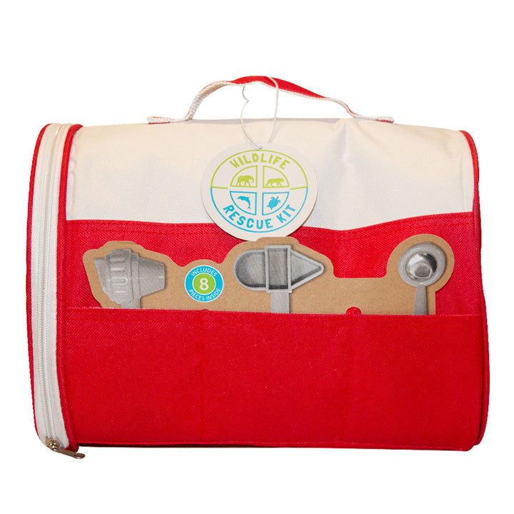 The Wildlife Rescue Kit is a red and white bag with a handle and front pocket featuring cardboard cutouts of rescue tools like a flashlight, shovel, and dish—ideal for caring for plush animals anywhere you go.