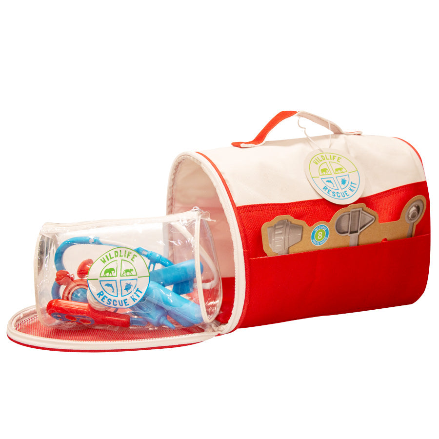 The Wildlife Rescue Kit is a red and white portable crate bag with a handle, featuring toy medical tools in a clear zippered compartment and illustrated tools on the front—ideal for caring for plush animals in need.